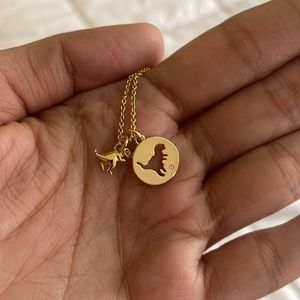 Coach brand new dinosaur pendant, not an outlet item